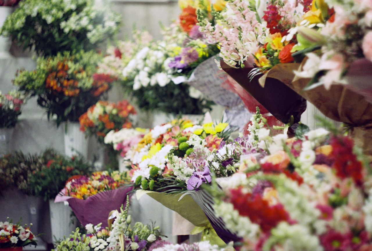 Beautiful display of colorful floral bouquets in an indoor flower shop in Dnipro, Ukraine.